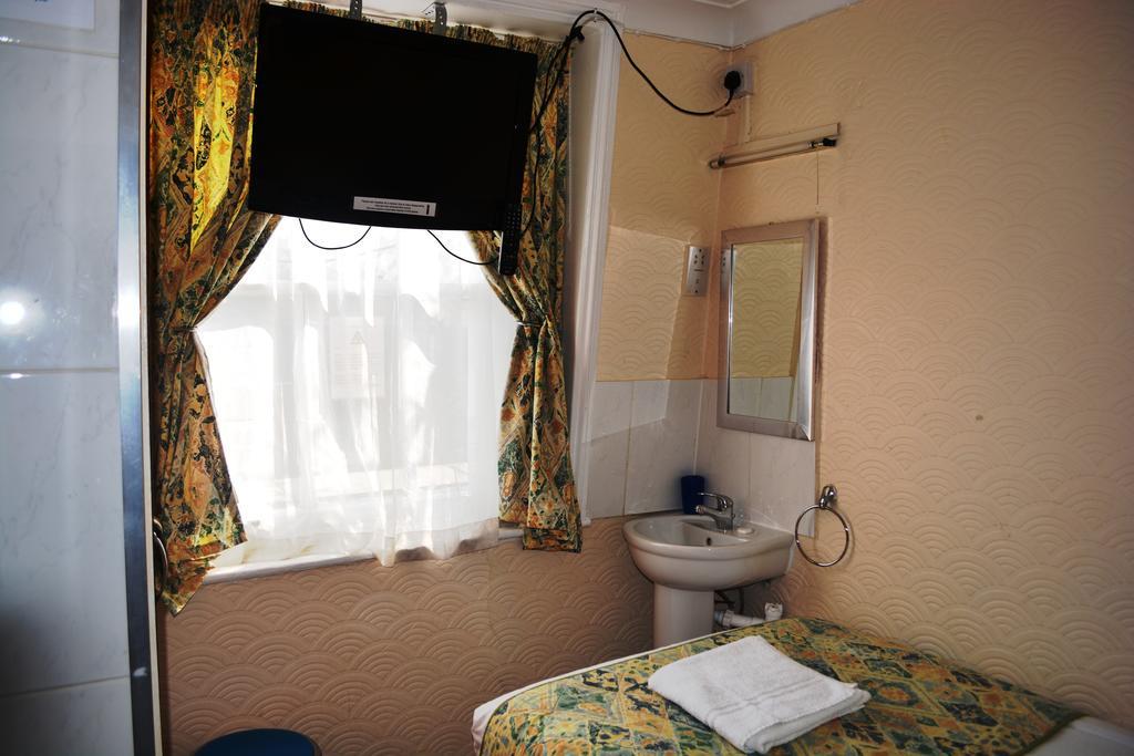 Falcon Hotel London Værelse billede