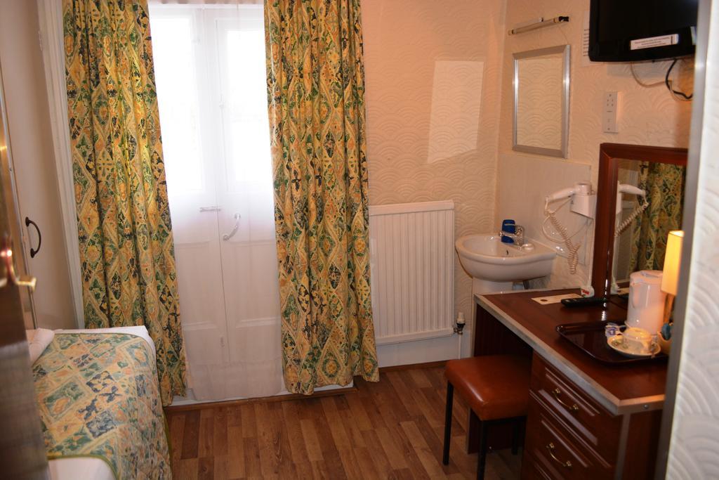Falcon Hotel London Værelse billede
